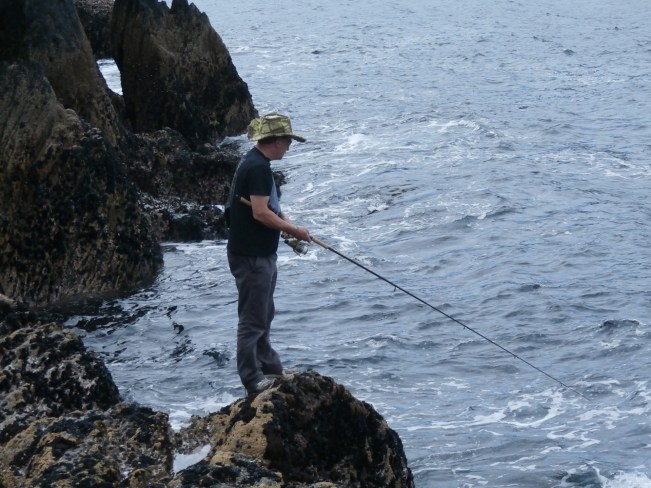 Spinning from a rocky ledge